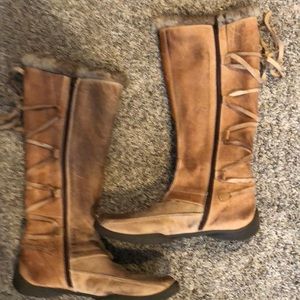 Knee high leather and fur boots